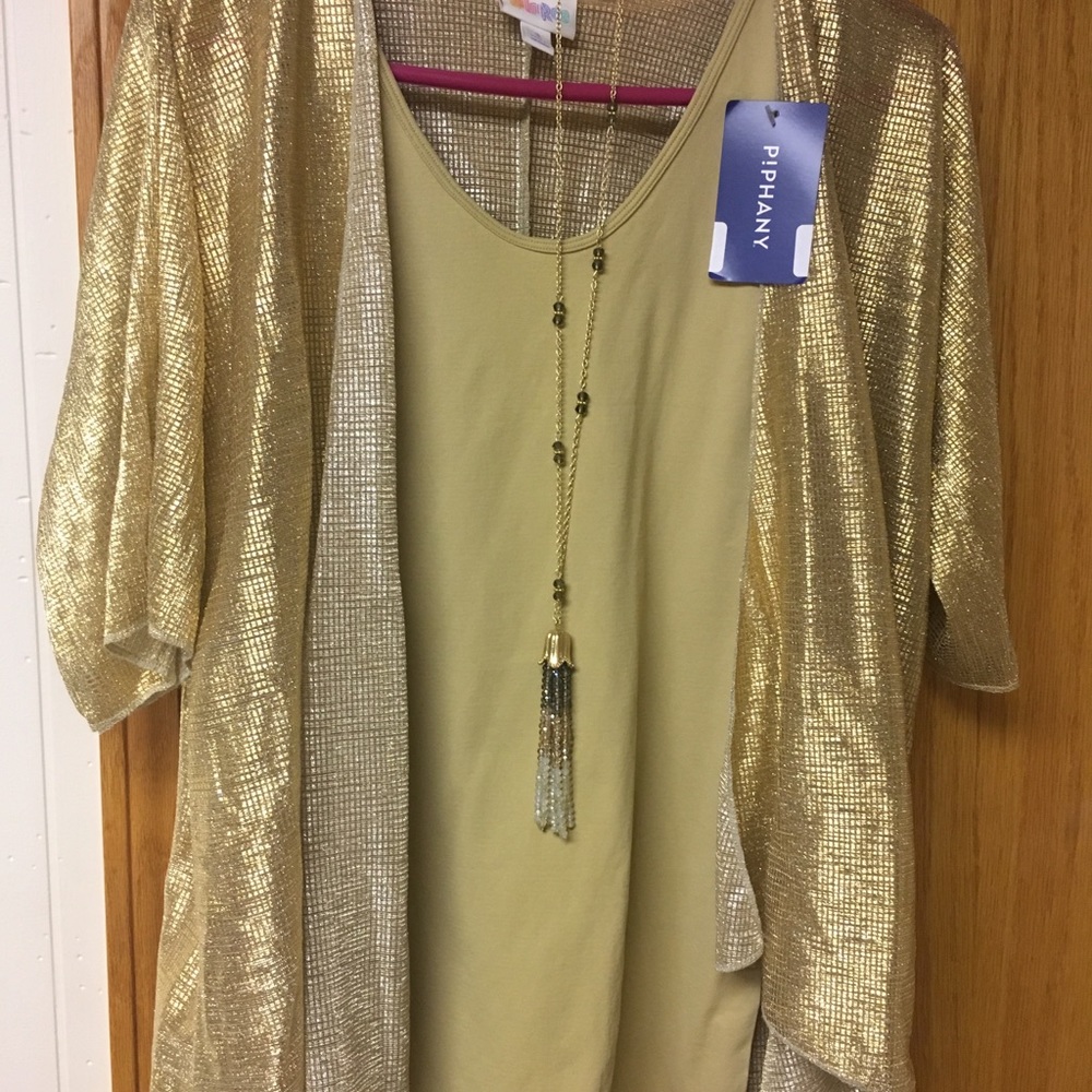 Beautiful gold/tan one size Piphany tank top.
